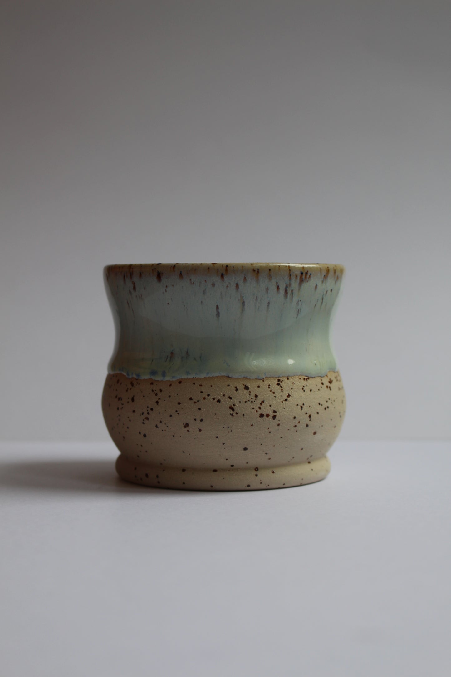 White and light blue tumbler