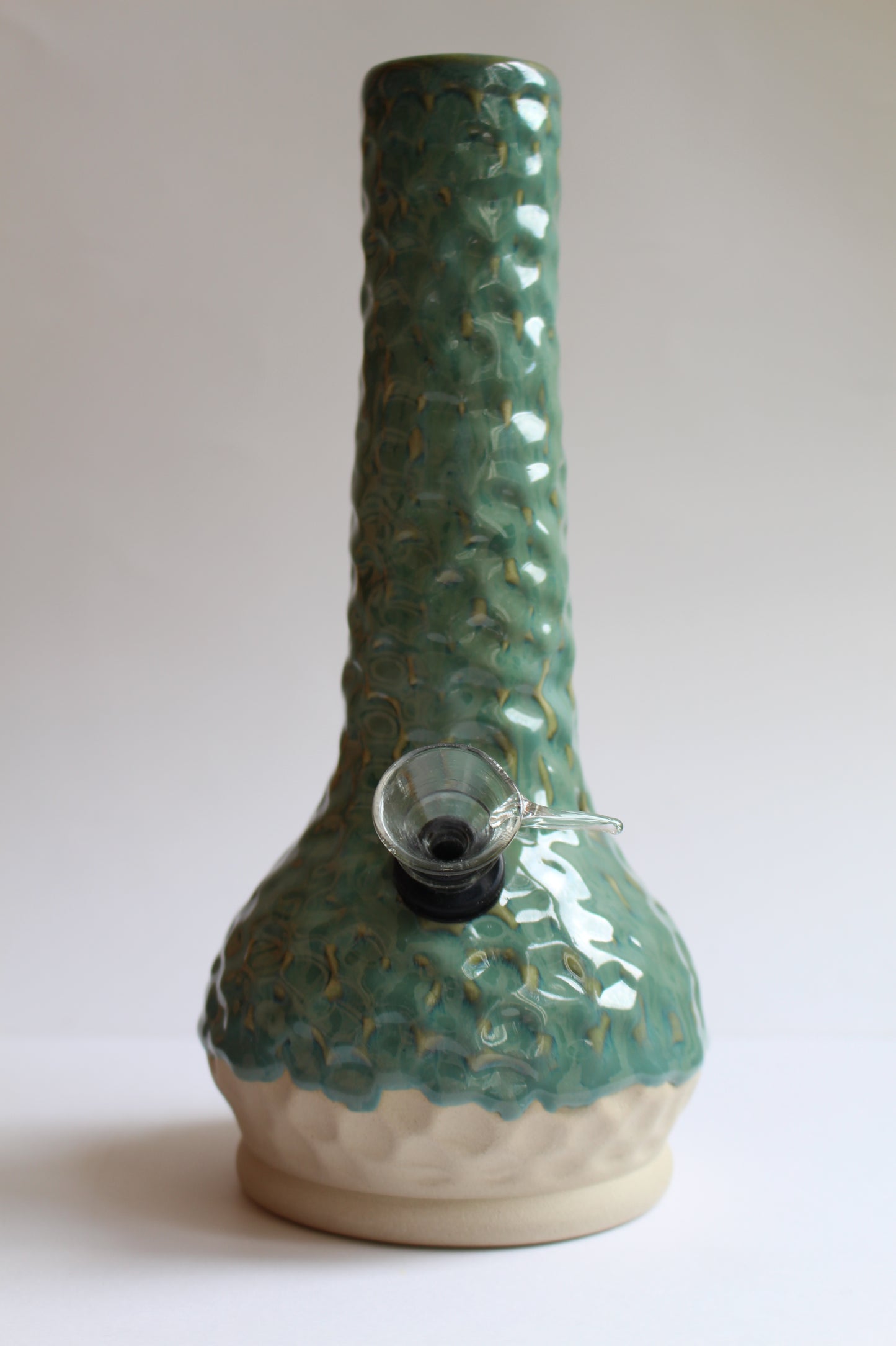 Small light greenish blue vase