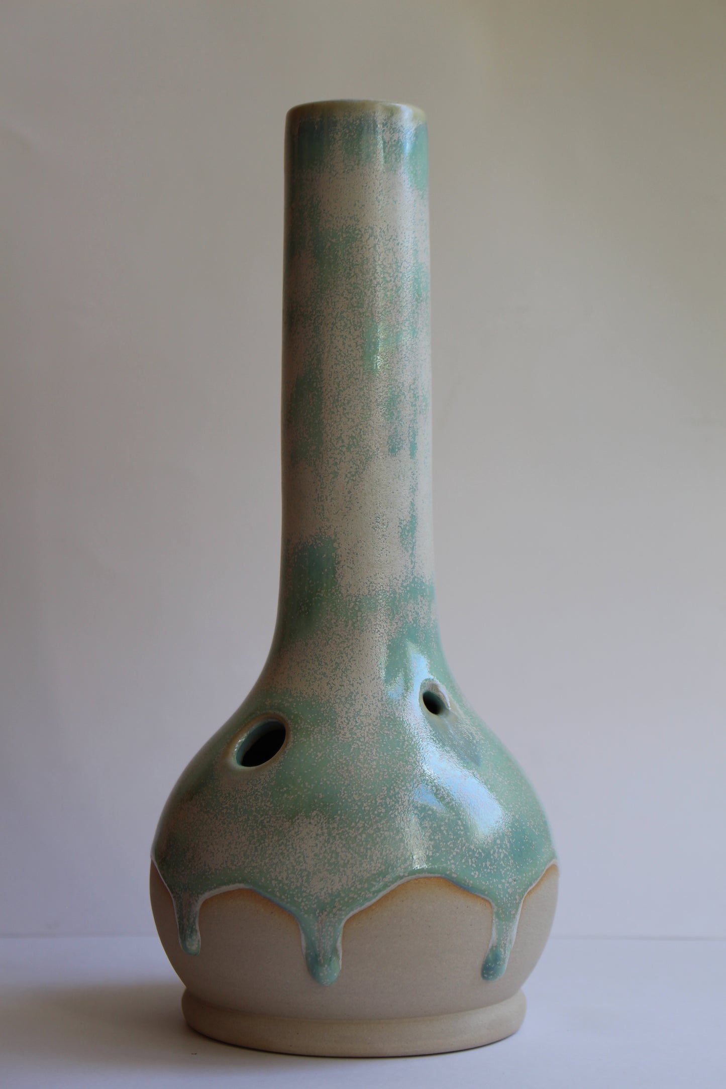 Shimmery green drip vase