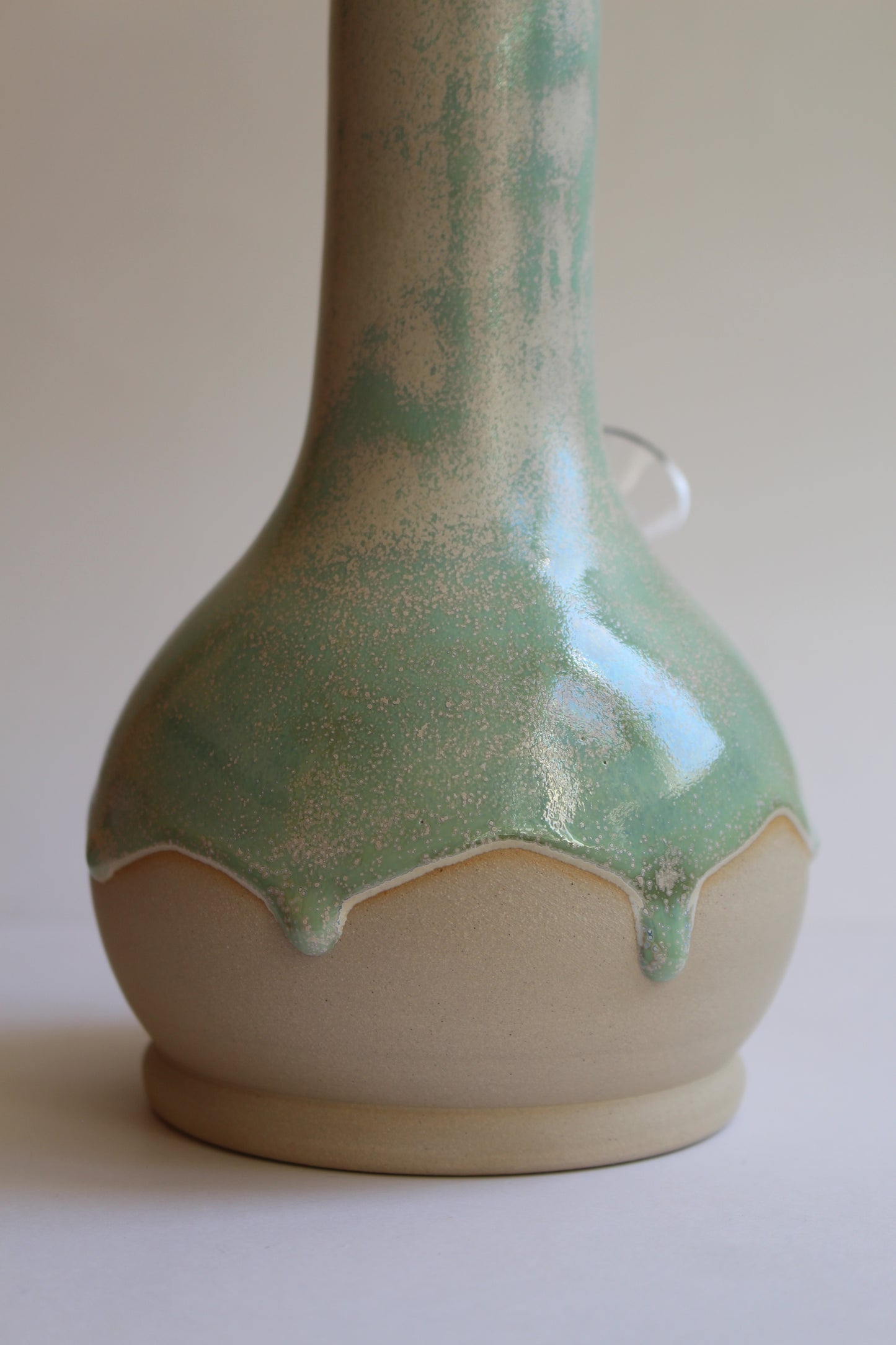 Shimmery green drip vase